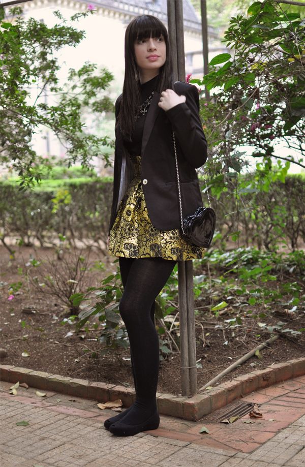 look preto e dourado